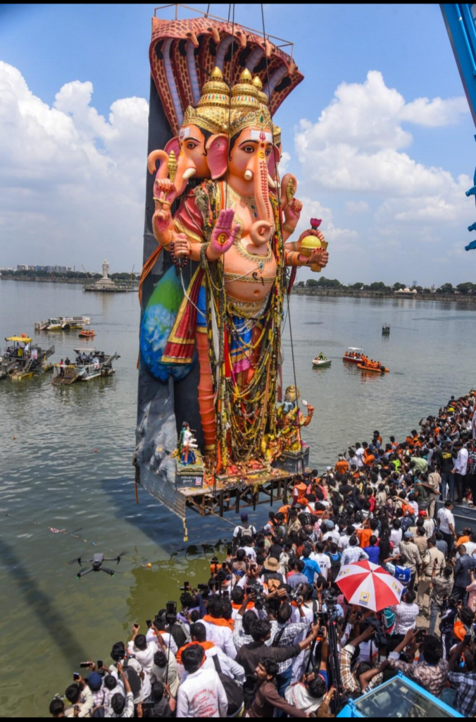 Passengers and special buses near Hussain Sagar during Ganesh immersion in Hyderabad