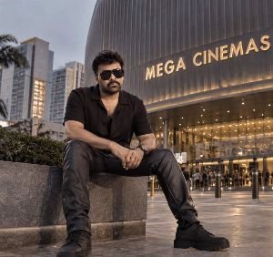 Megastar Chiranjeevi and Asian Cinemas logo featured in a report about two new theatres in Hyderabad