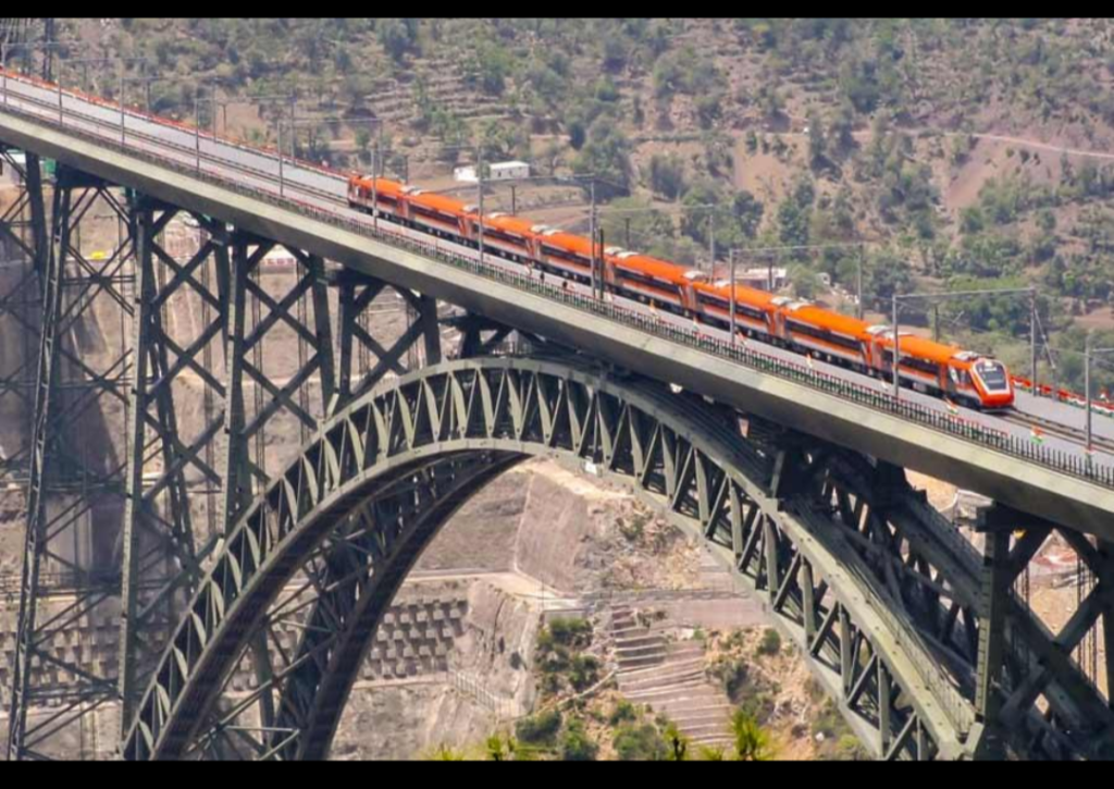 Vande Bharat Express crossing the world’s highest Chenab Railway Bridge at 100 kmph in Jammu and Kashmir